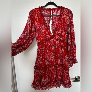 Beautiful red flower dress. Lacy and flowing . Pair great with white sandals.